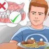 how to get food out of wisdom tooth hole