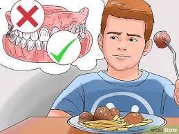 how to get food out of wisdom tooth hole